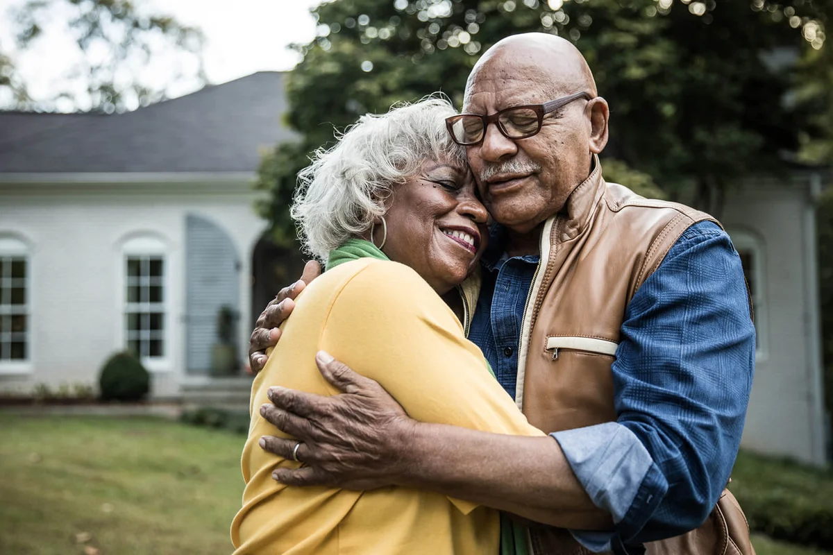 Senior couple embracing outdoors