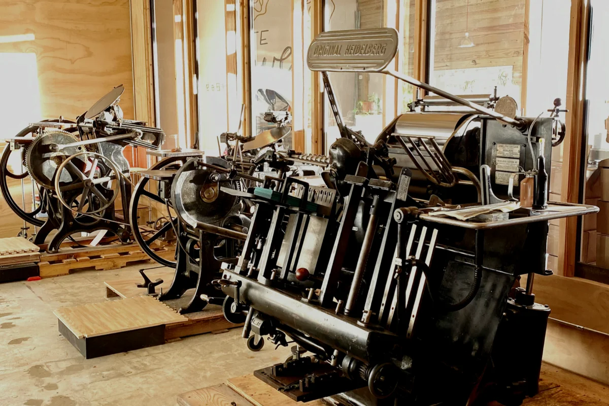 Photo of INK MEETS PAPER's printing presses.