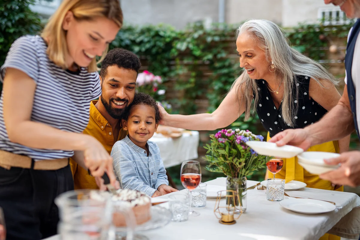 multigenerational family meal with grandmother and grandchild