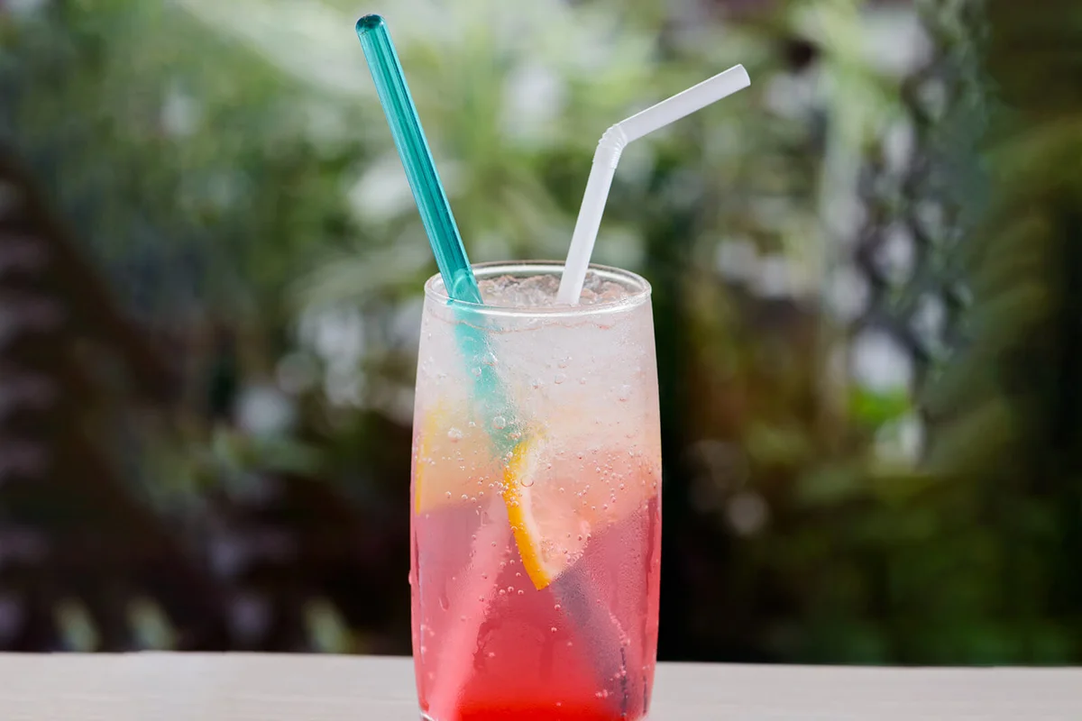 Pink drinks and lemon garnish