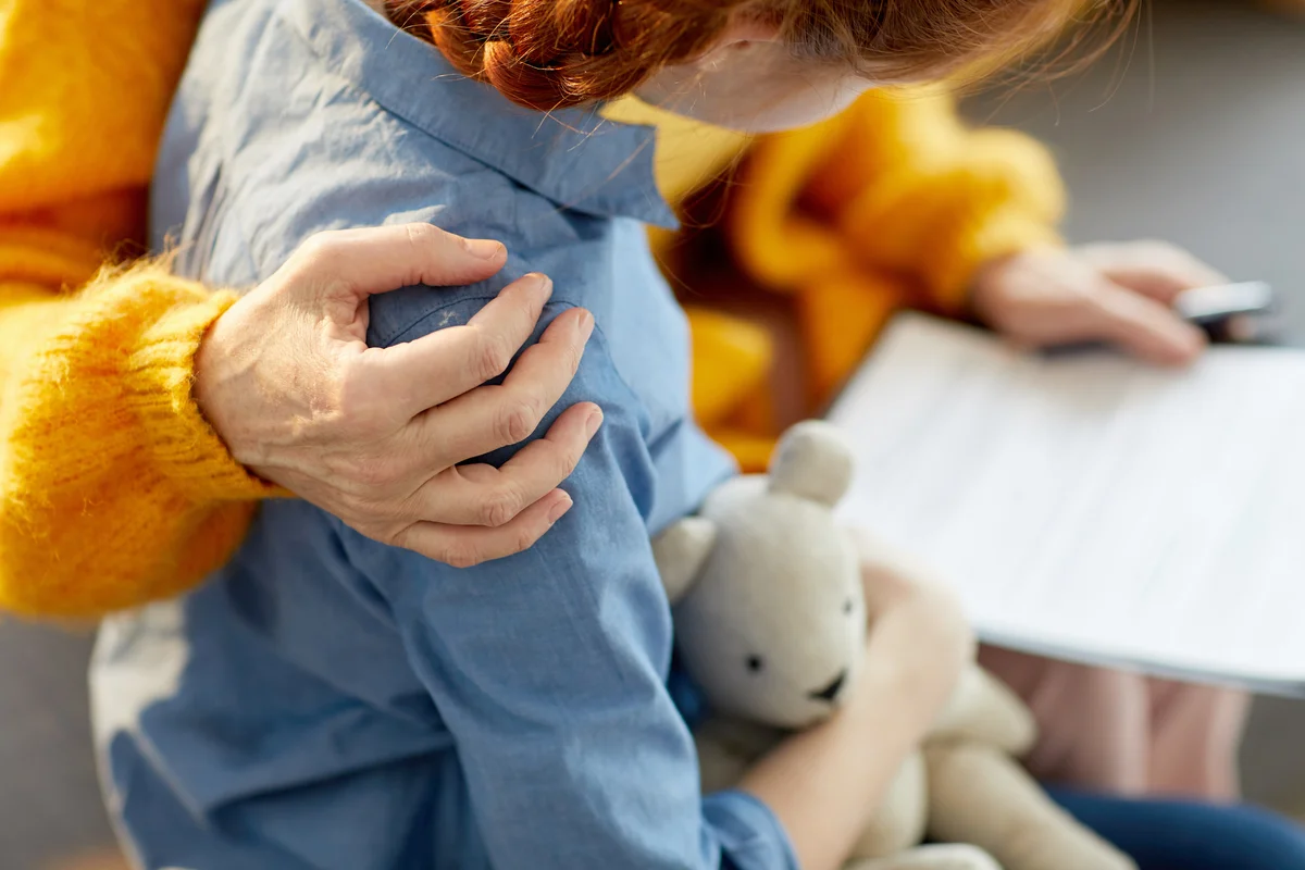 Little girl and mother in family therapy