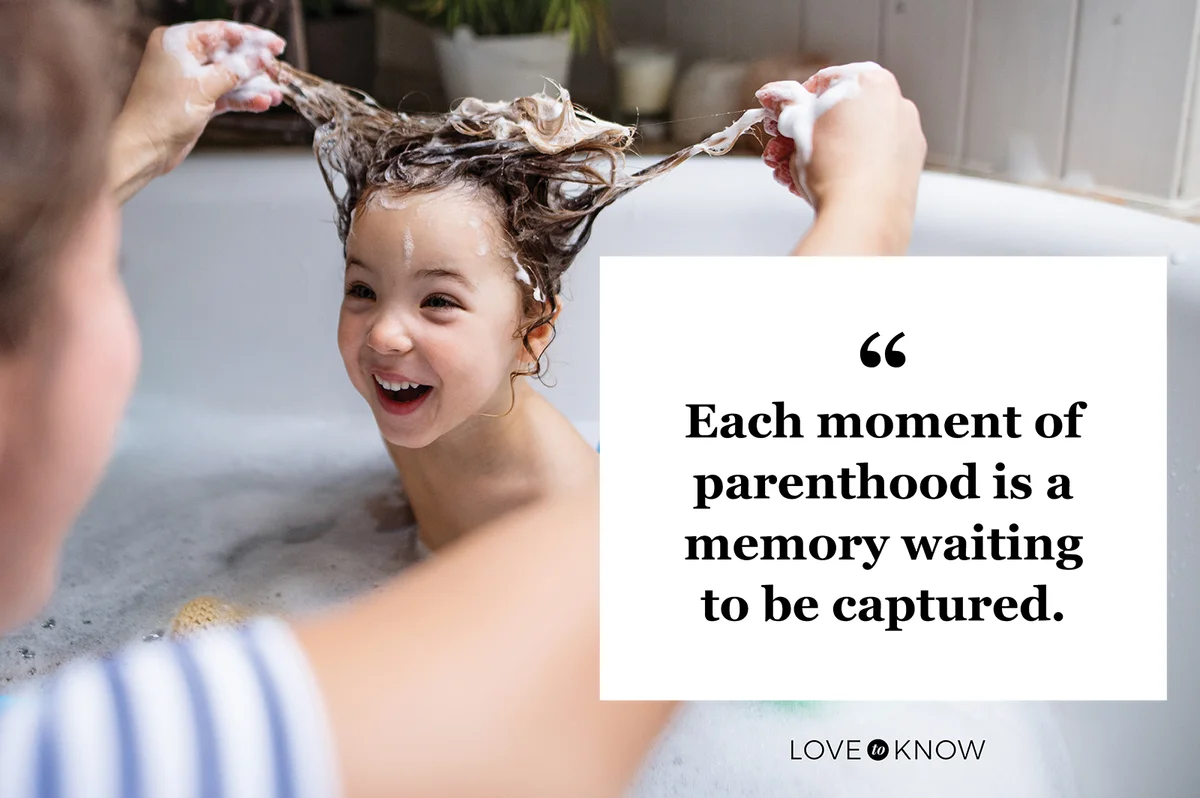 Mother with small daughter in bathroom at home, having fun in bath