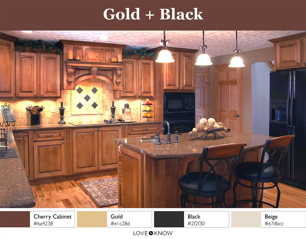 Gold and black kitchen with cherry cabinet