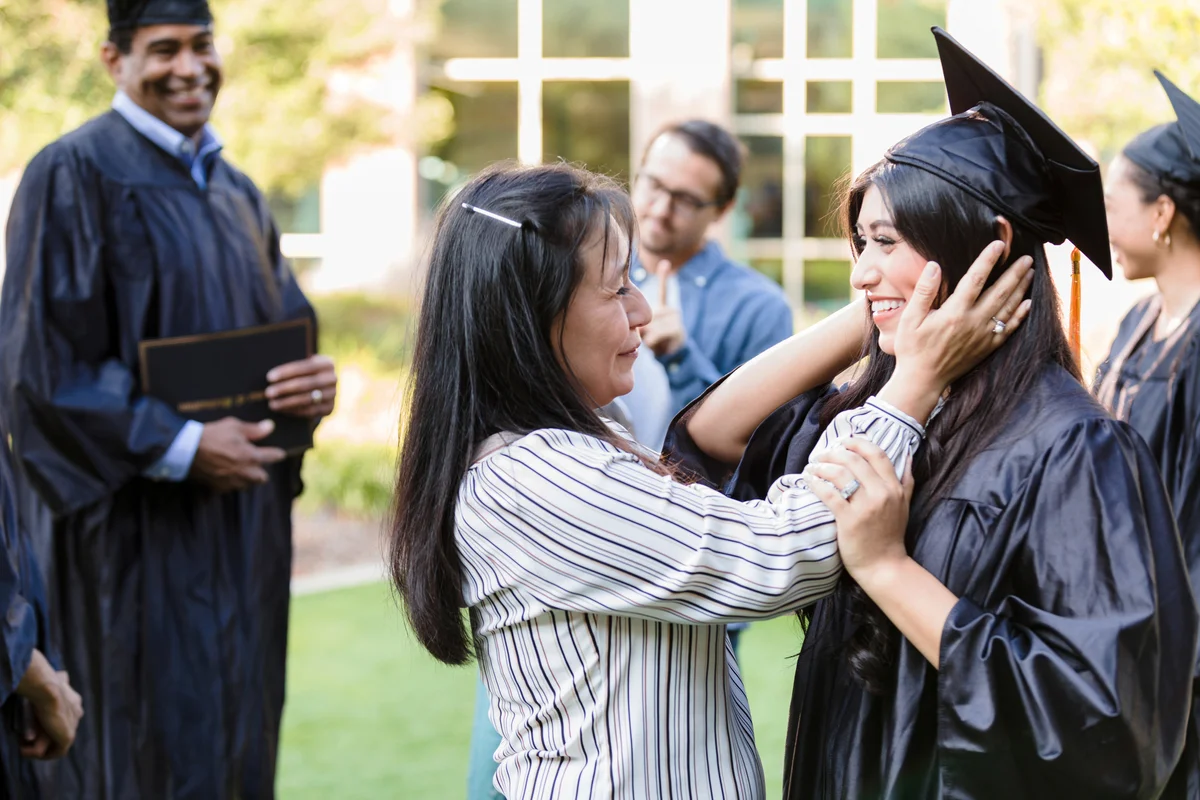 Mother cries after young adult daughter's graduation