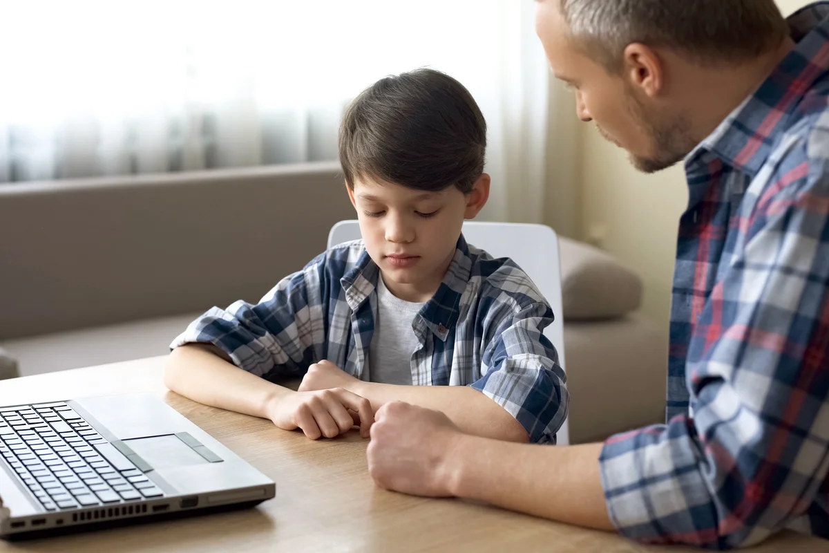 Father talking to son