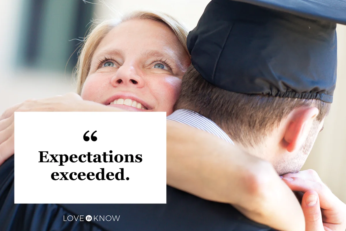 Mother Hugging Son in Graduation Ceremony