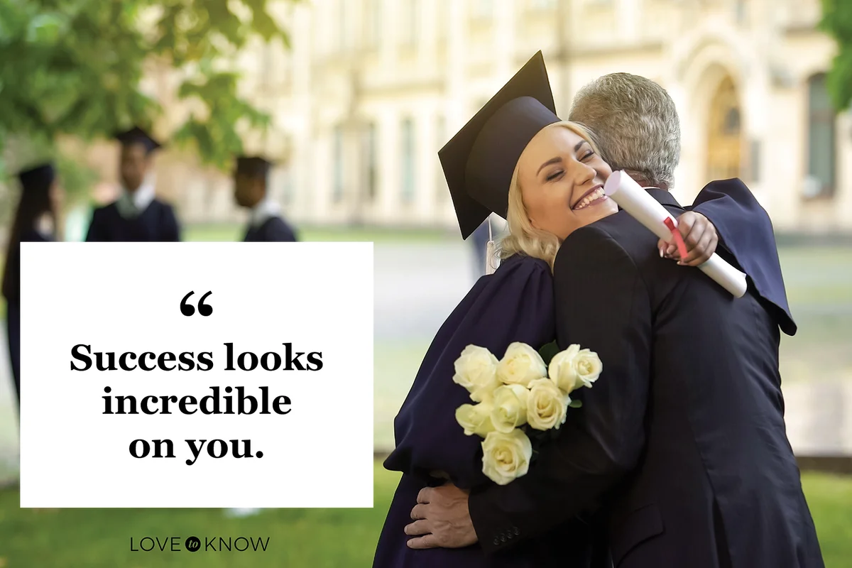 Father hugging his graduate daughter giving flowers