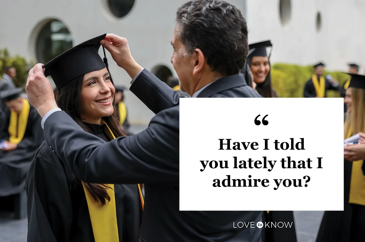 Proud father arranging the mortarboar of her graduating daughter