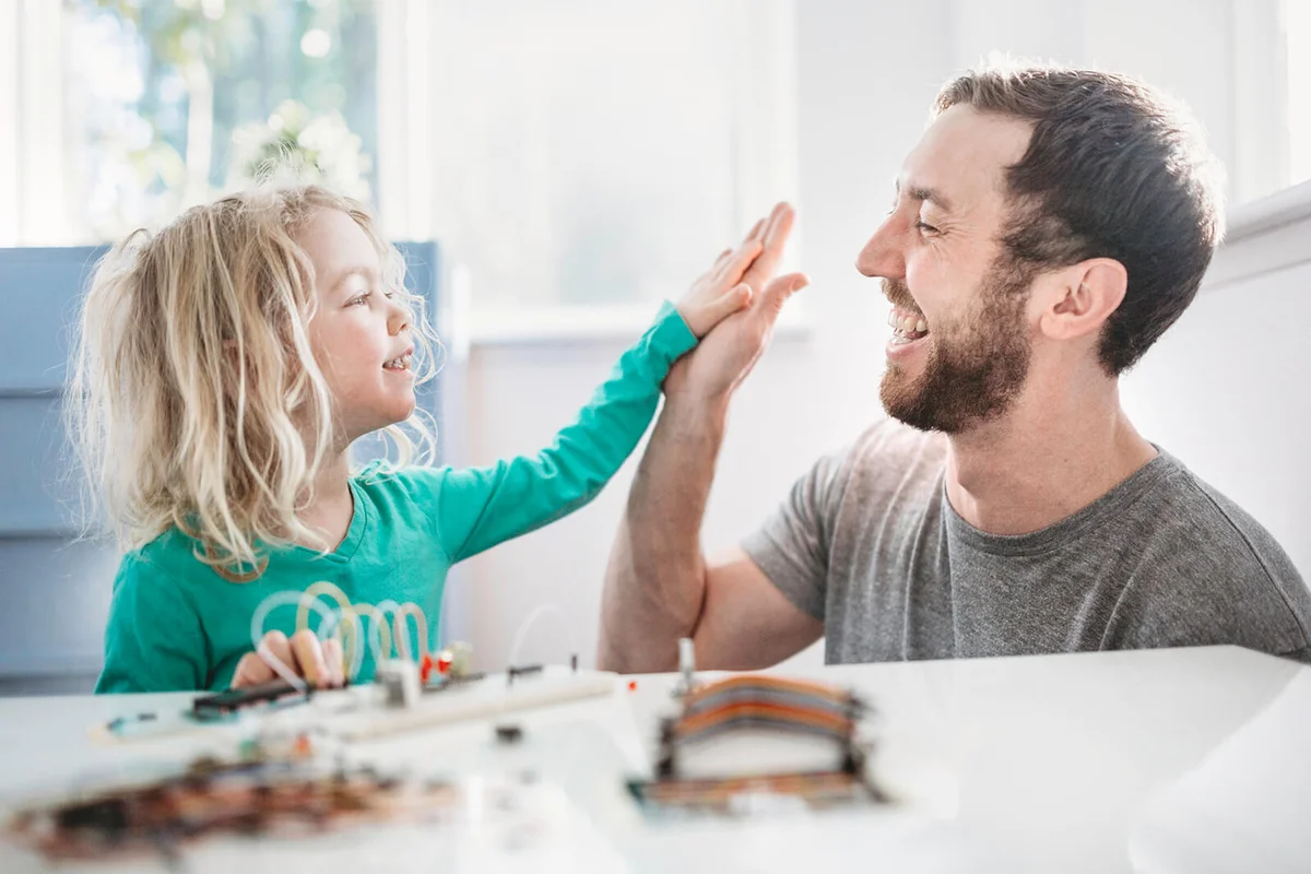Dad Teaching Daughter Electrical Engineering