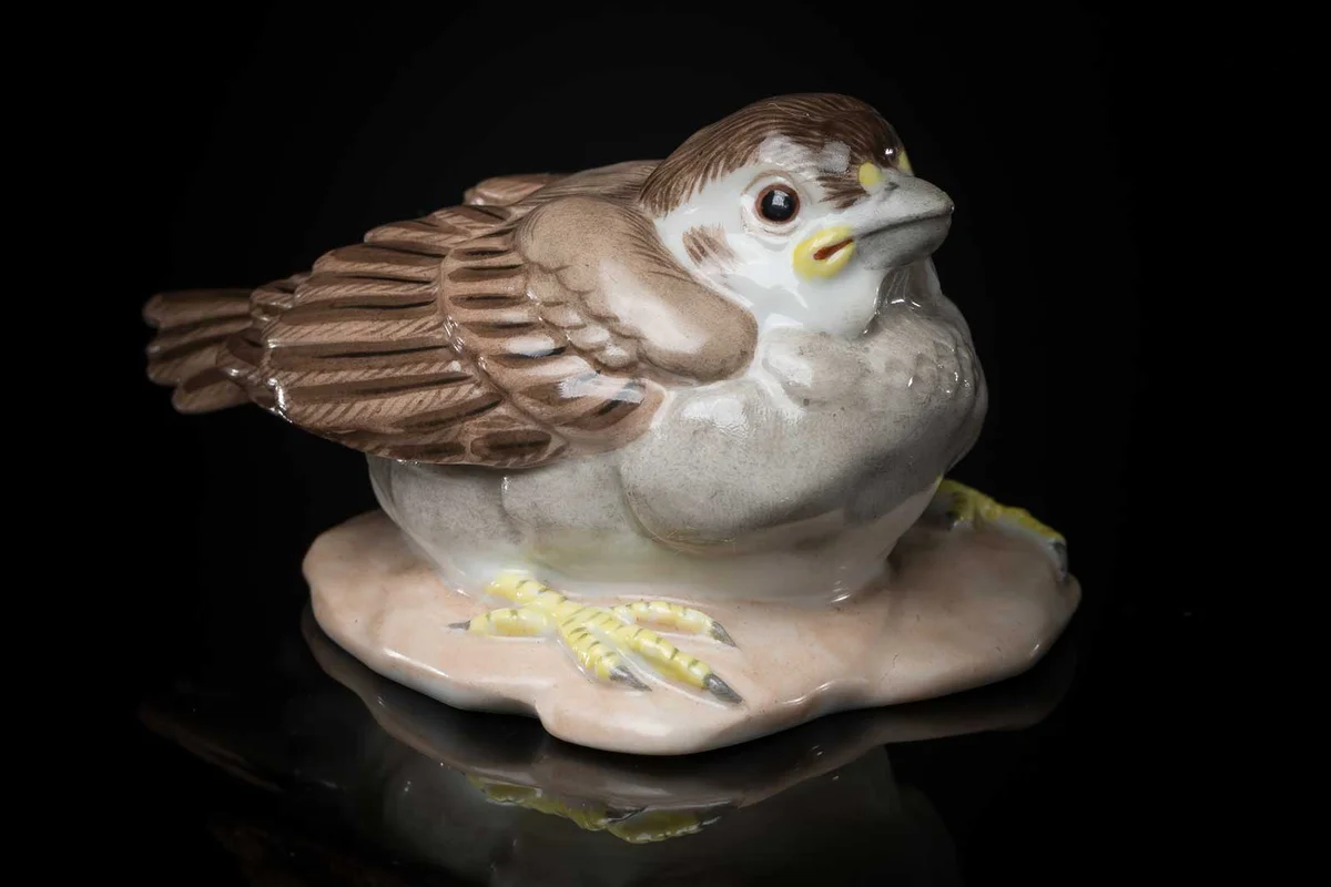 vintage porcelain bird figurine