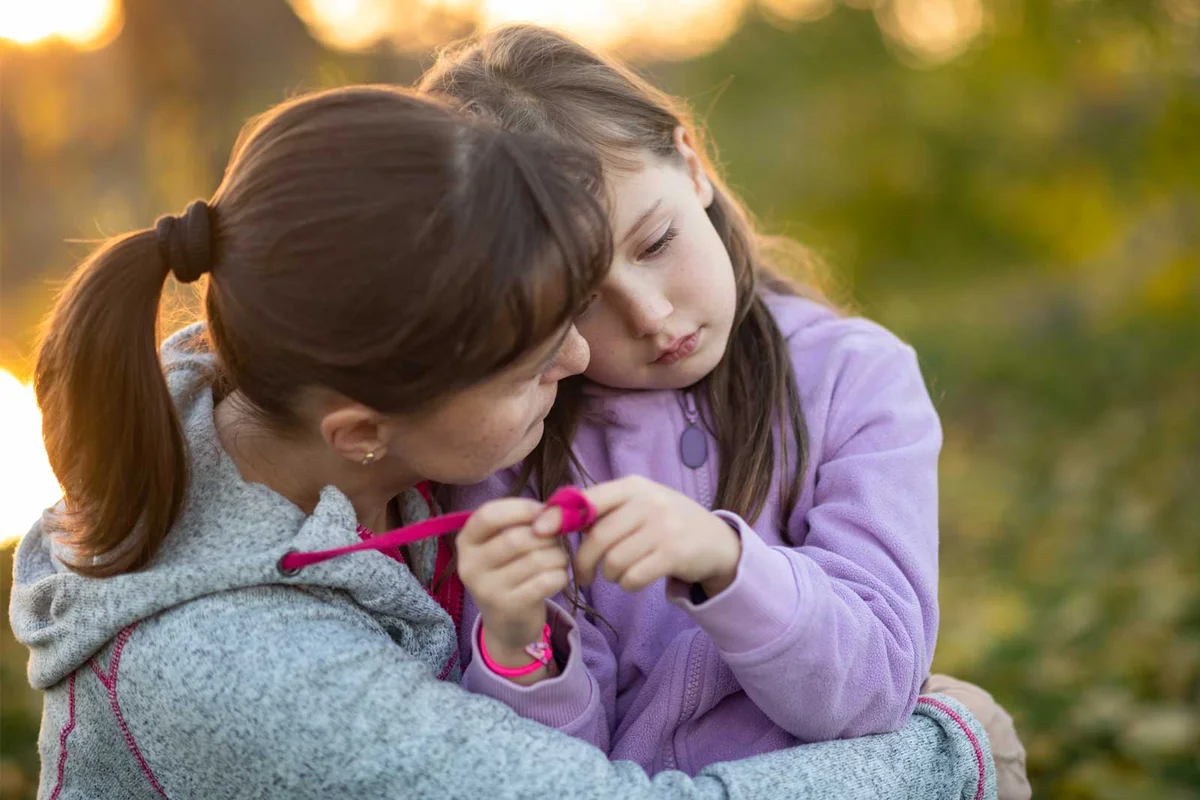 mother comforting upset child