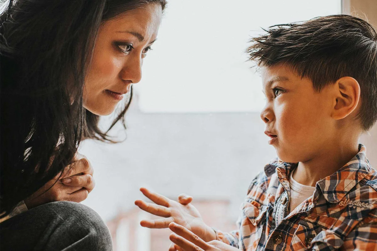 child communicating with mother