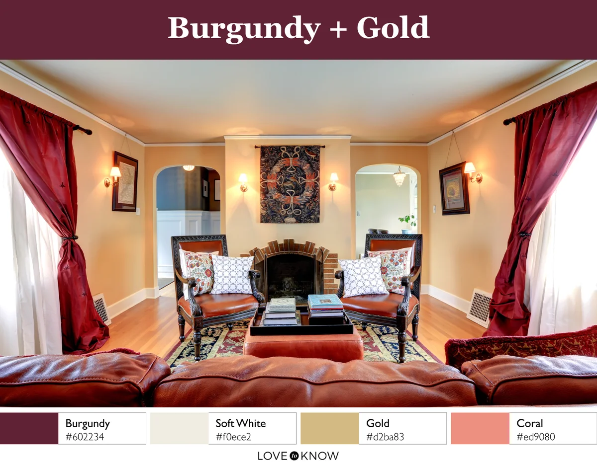living room with burgundy and gold color palette