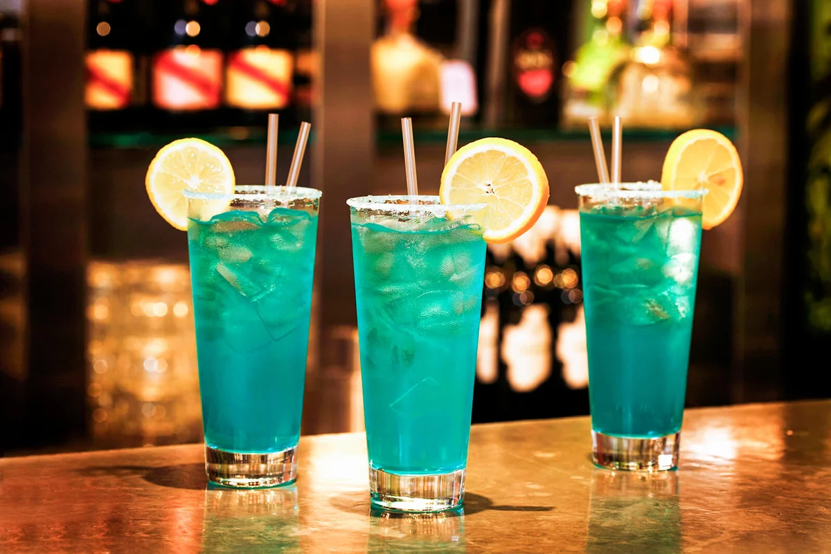 Blue Crush cocktails with rum on bar