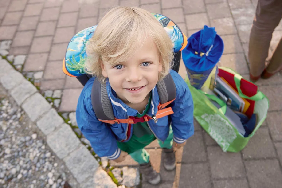 smiling child on first day of school