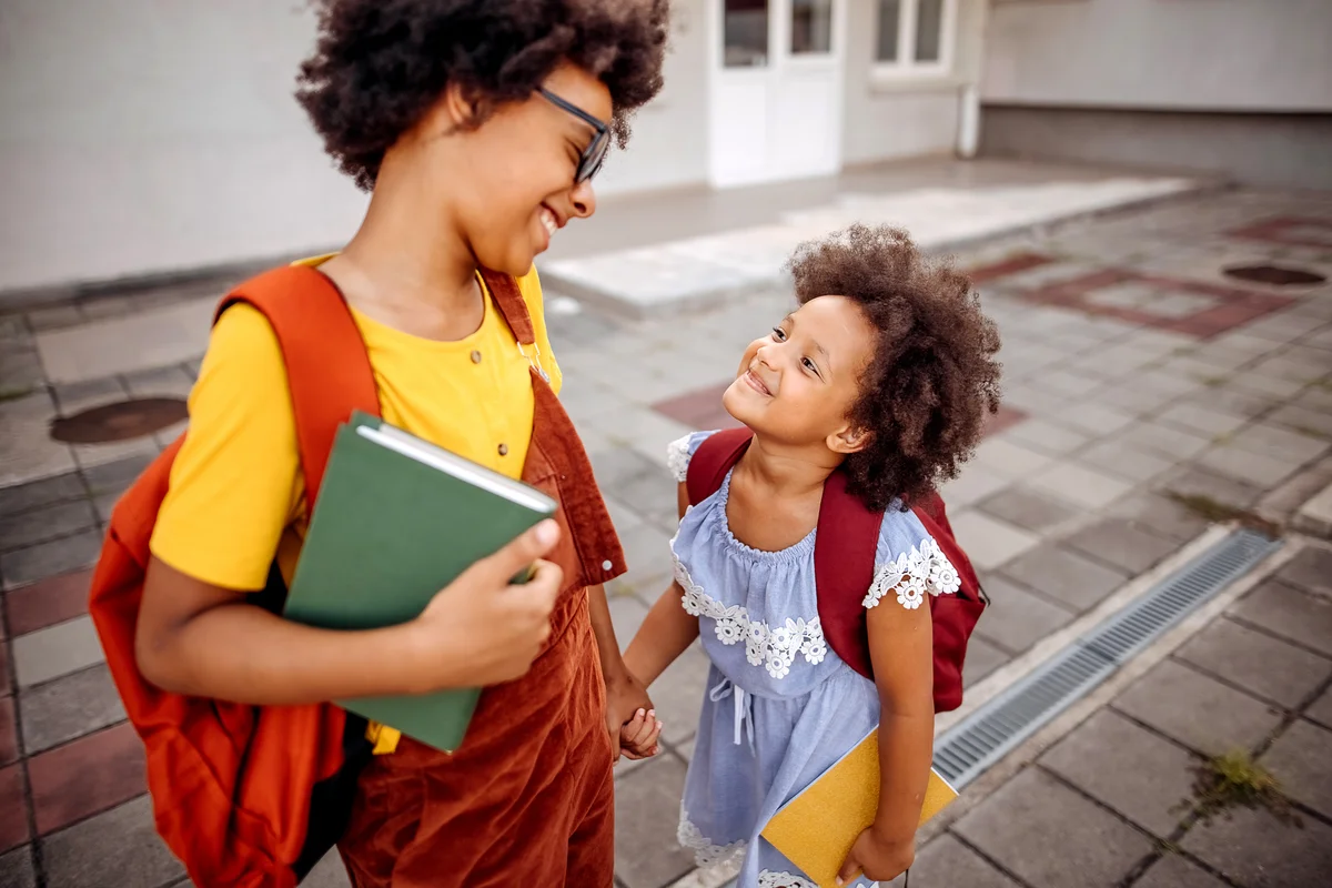 sisters on the first day of school