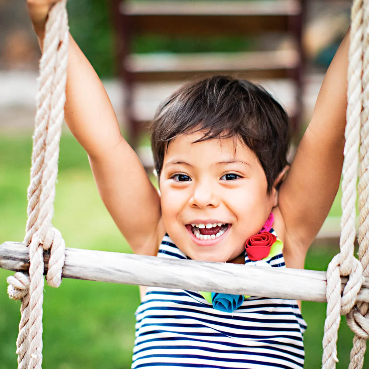 Cheerful Toddler Girl With Short Hair