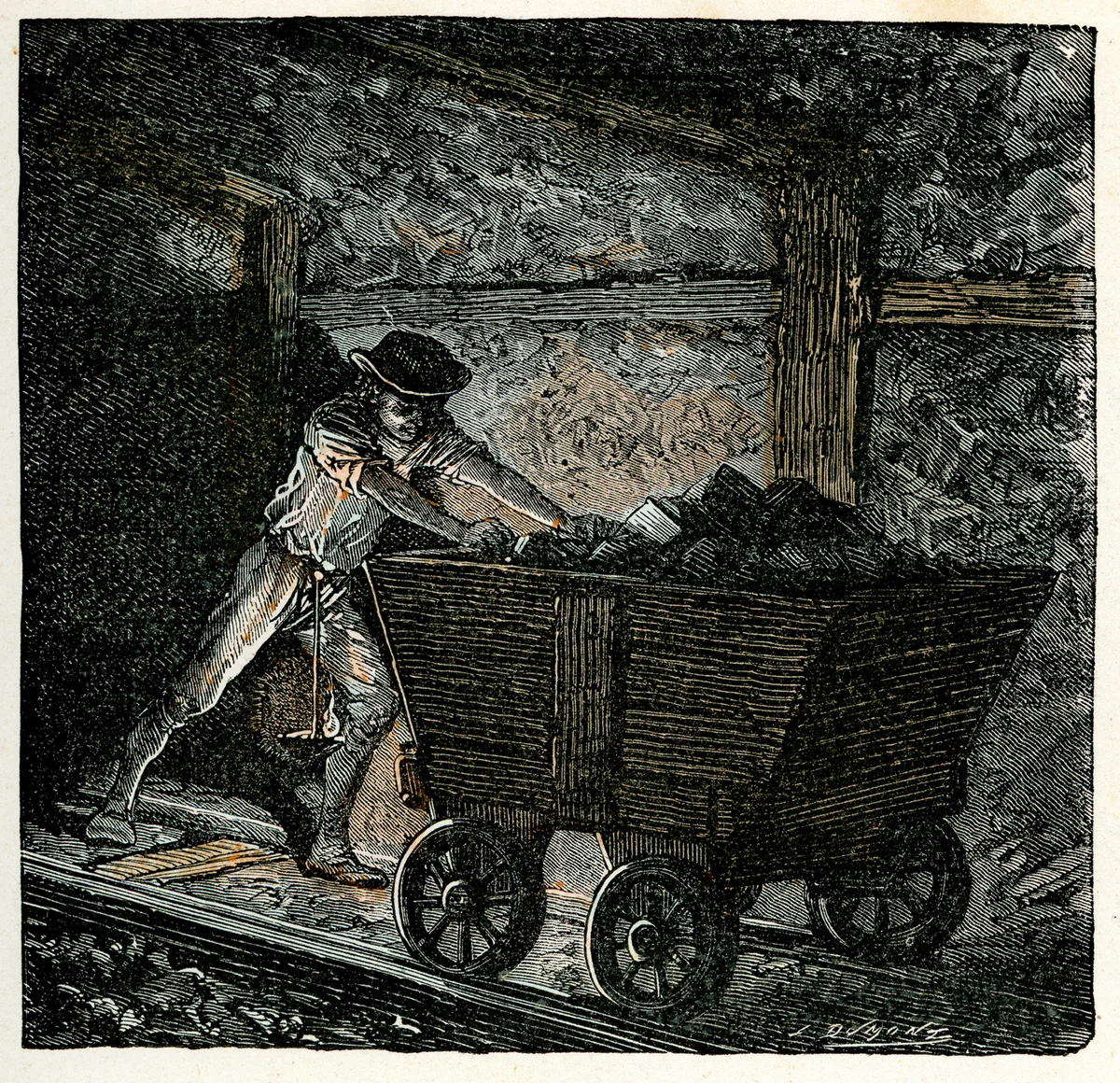 Victorian coal miner pushing a minecart