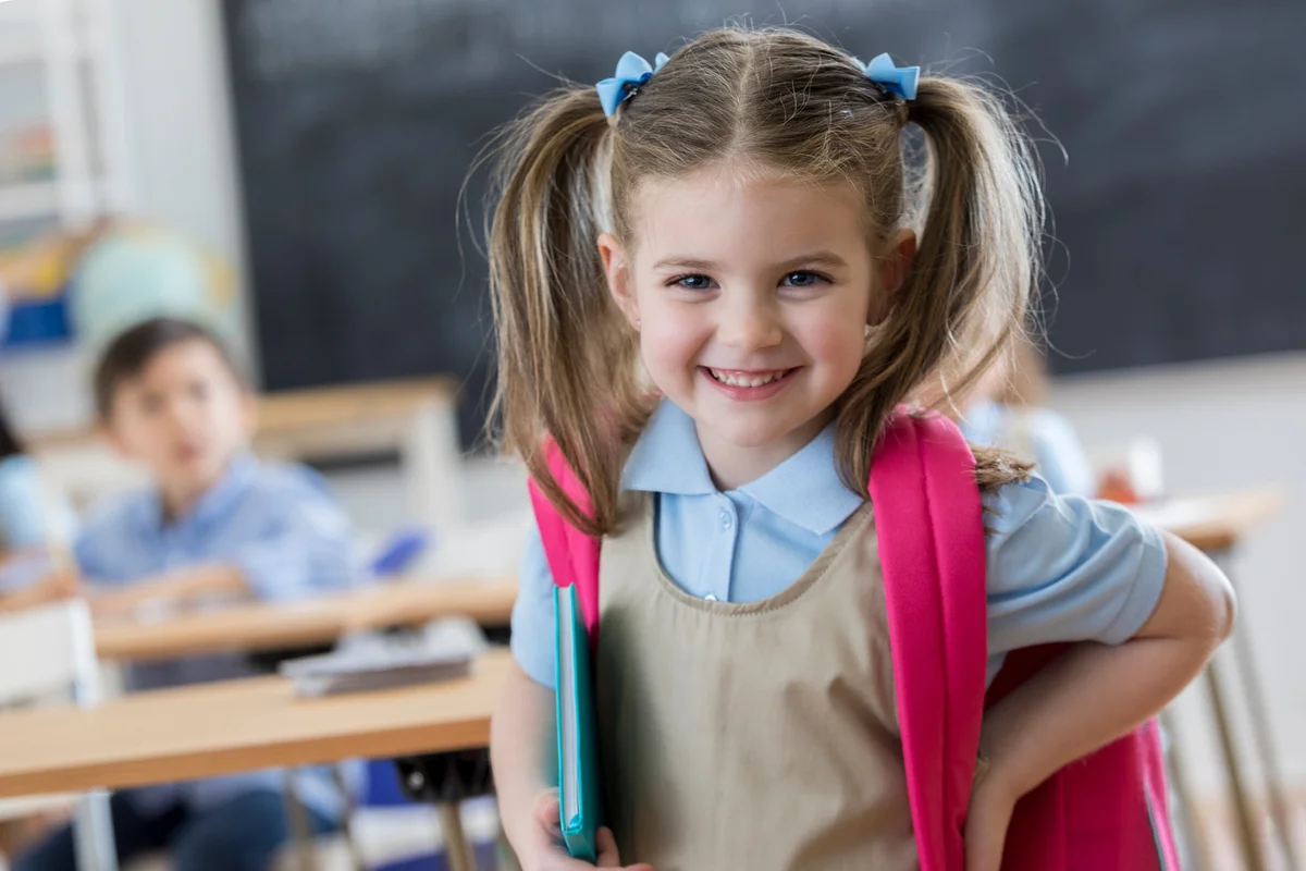 Confident preschooler in her classroom