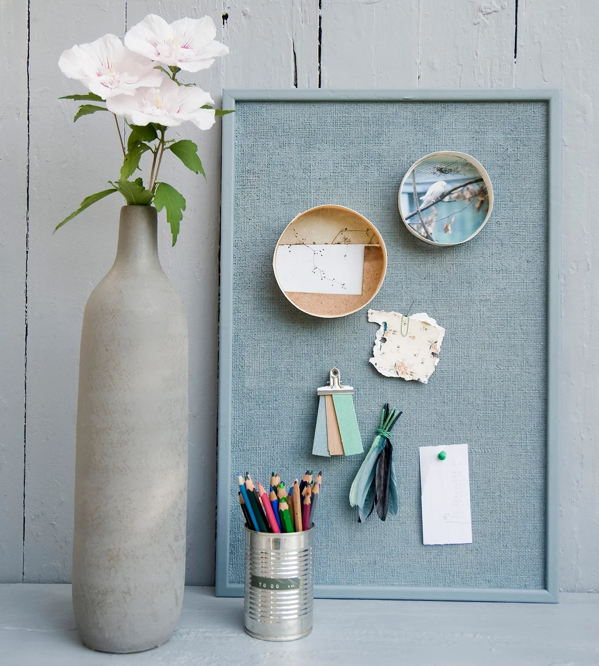 Bulletin board with frame