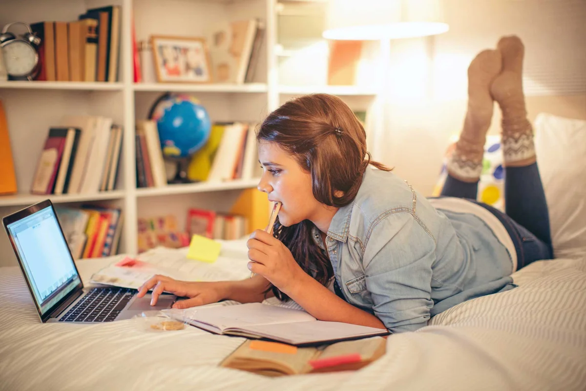 high school student staying organized with homework