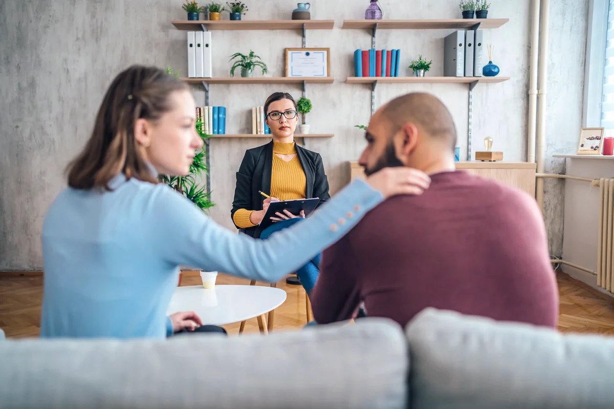 Husband and wife with marriage counselor