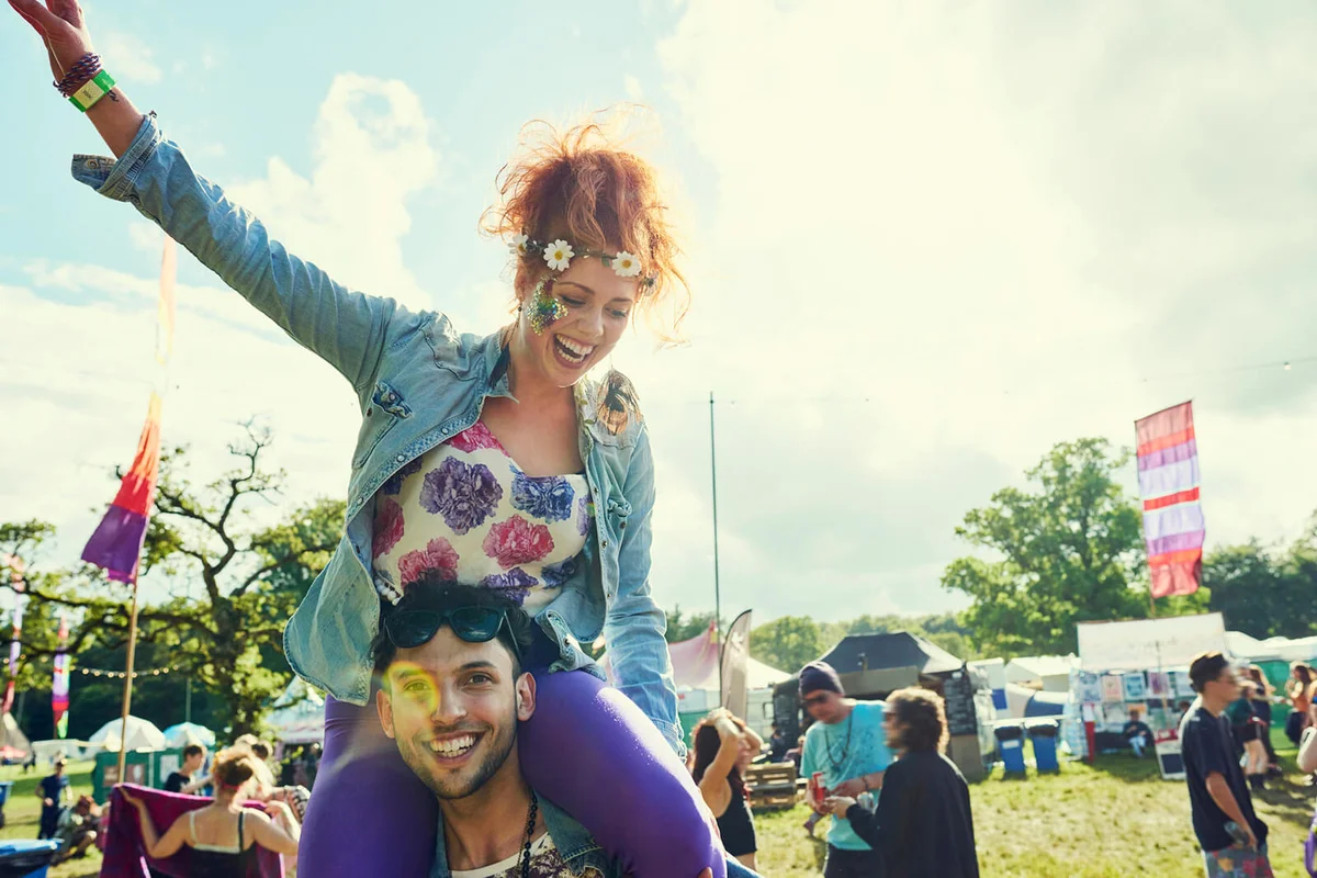 Group of friends having fun at a music festival