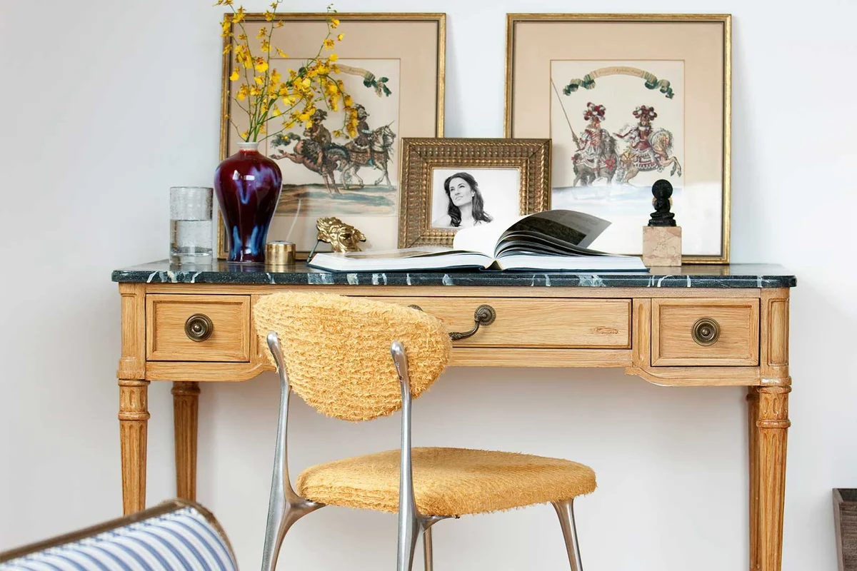 antique engraved artwork at home office desk