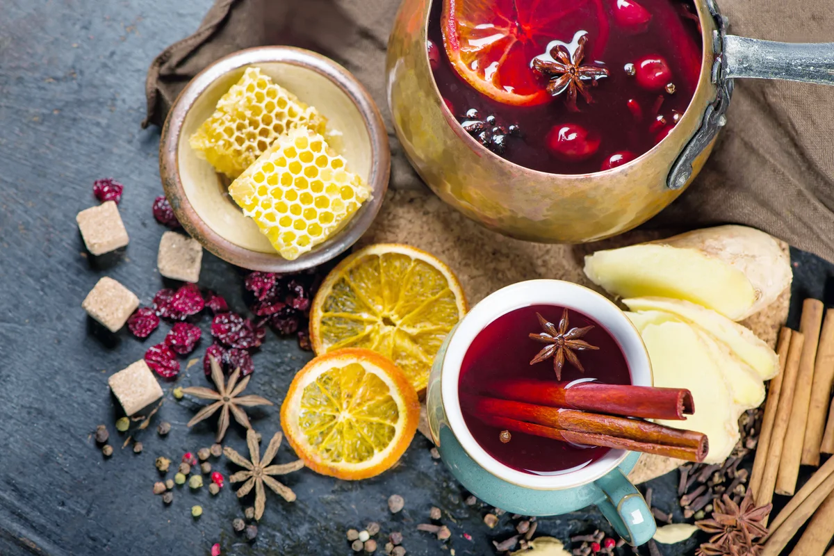 Mulled wine, blue pine tree branch and spices