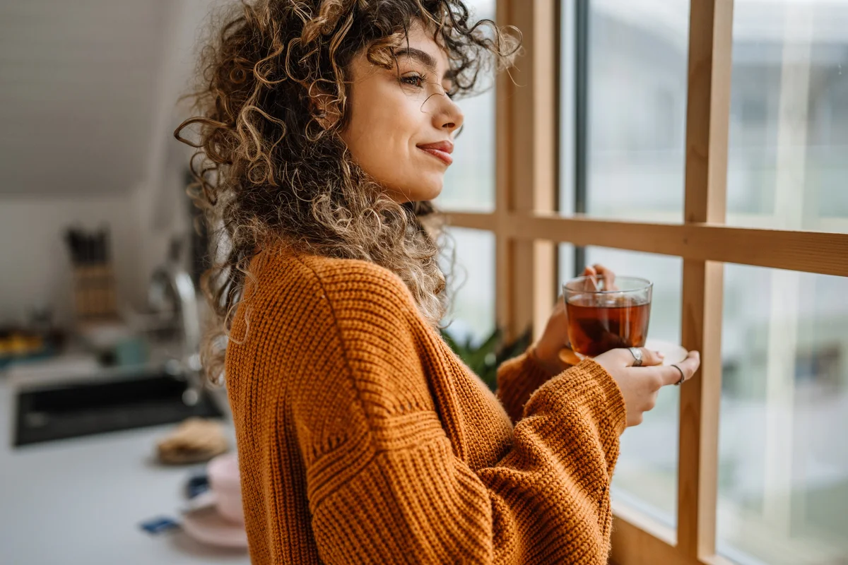 woman relaxing with anti anxiety tea