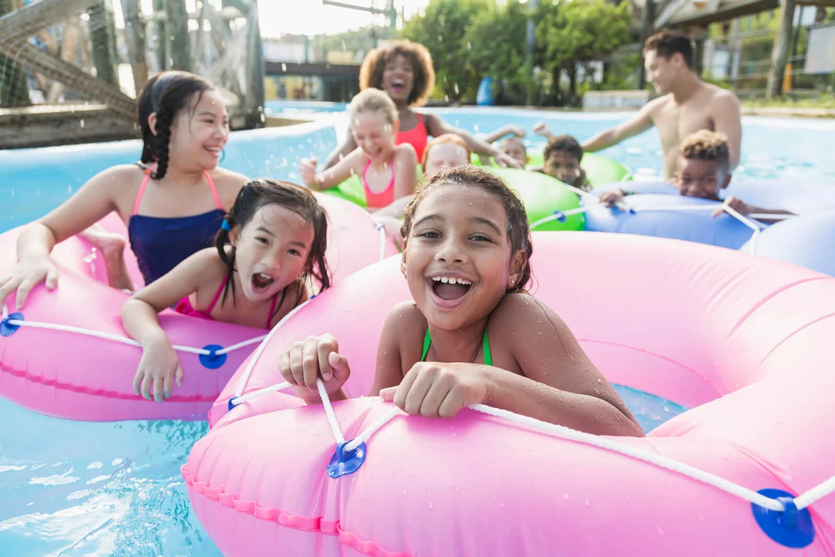 Kids having fun on lazy river at water park