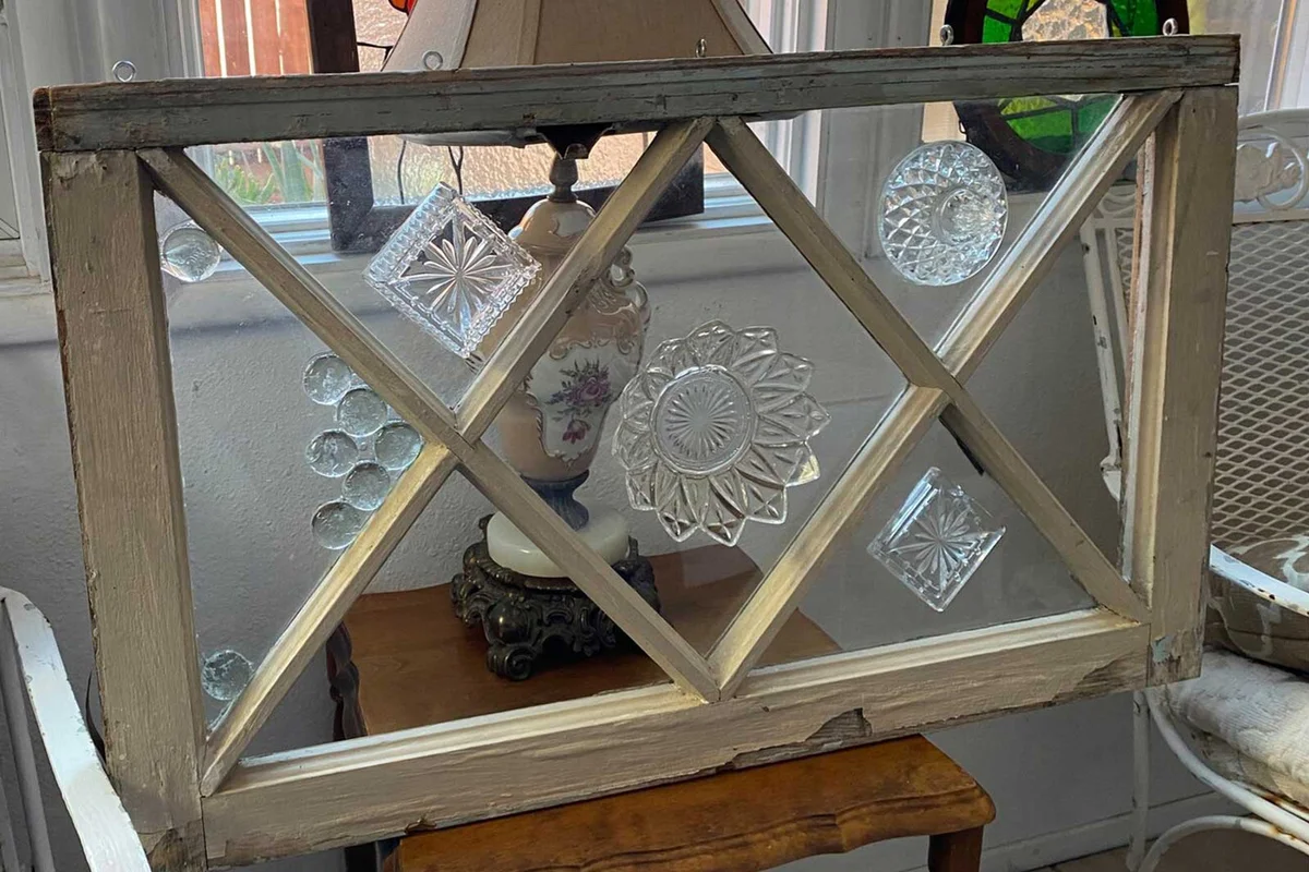 upcycled dishes on vintage window frame