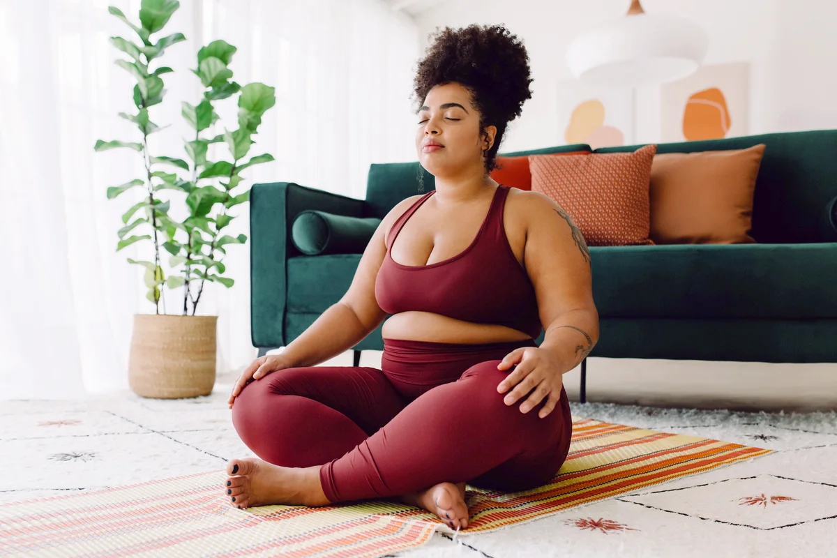 Woman doing meditation at home