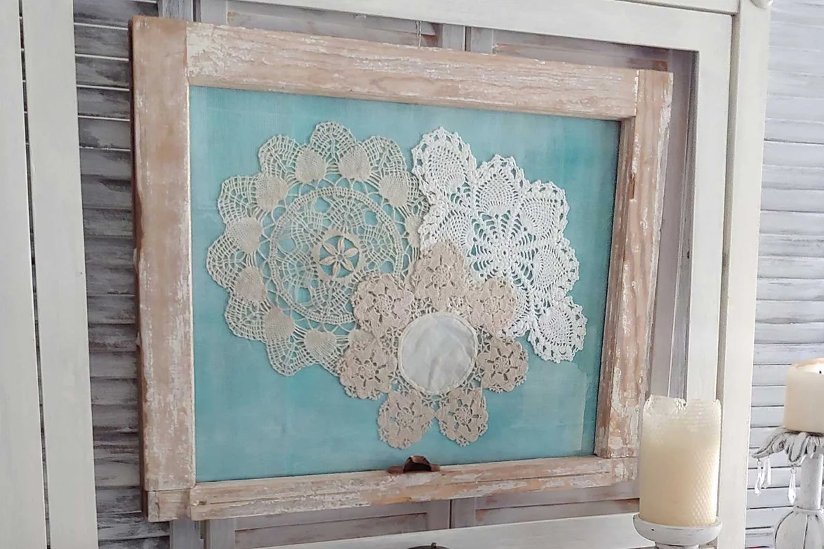 window frame with doilies