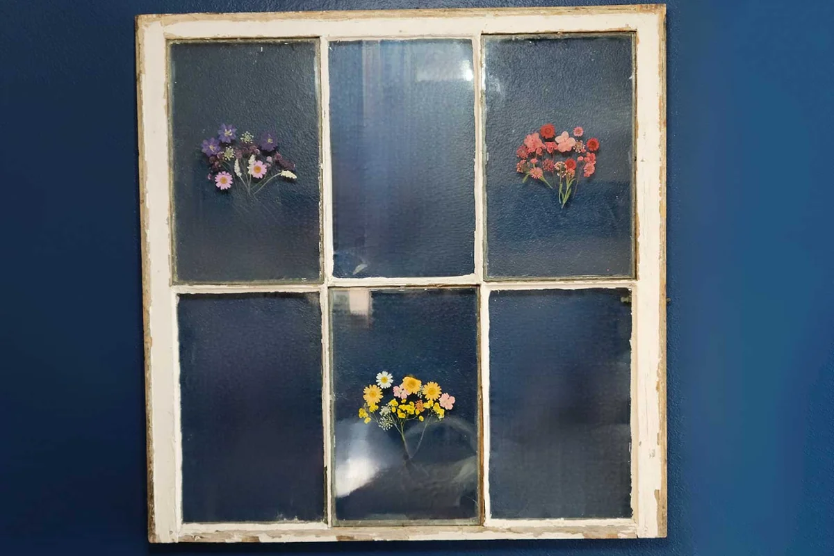 window frame with pressed flowers