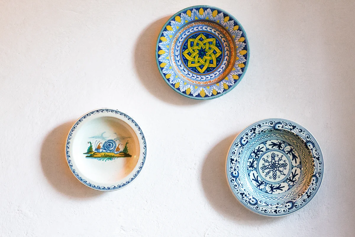 Three Italian Majolica Plates on Wall