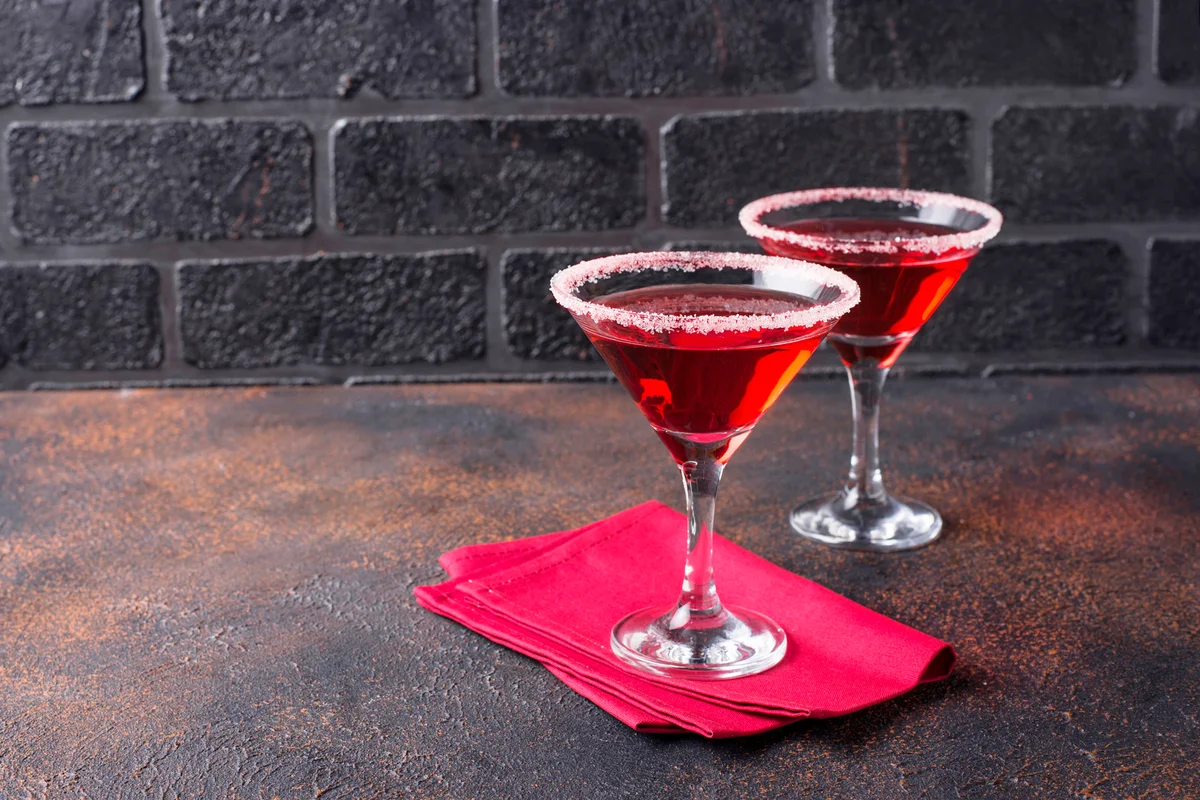 Red martini on dark background