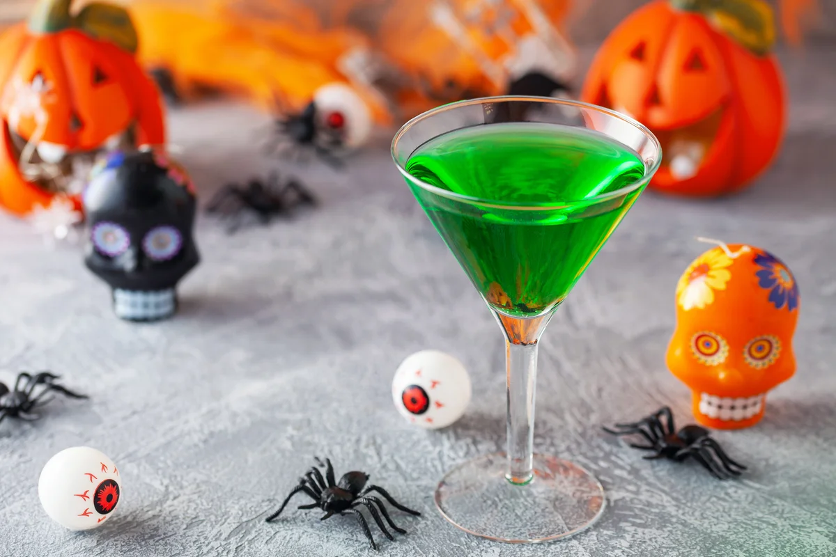 Halloween drinks green cocktail martini for party