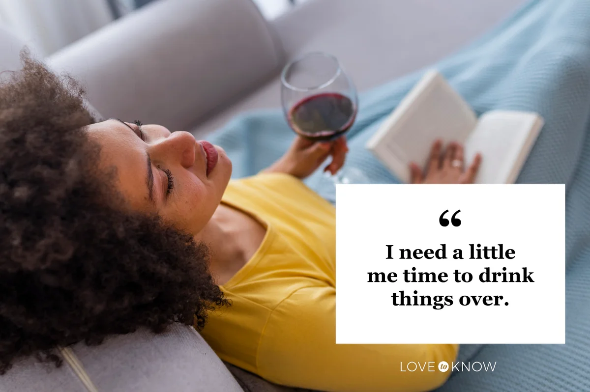 drinking quote woman relaxing on sofa with book and glass of wine