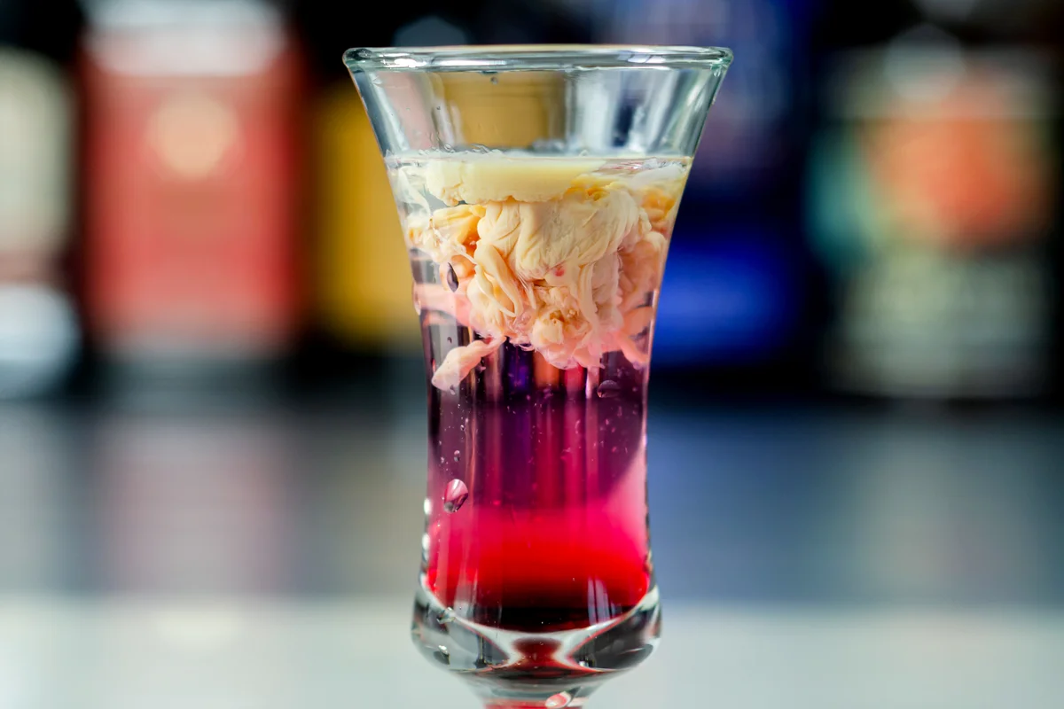 Liqueur and grenadine shot called Brain Hemorrhage