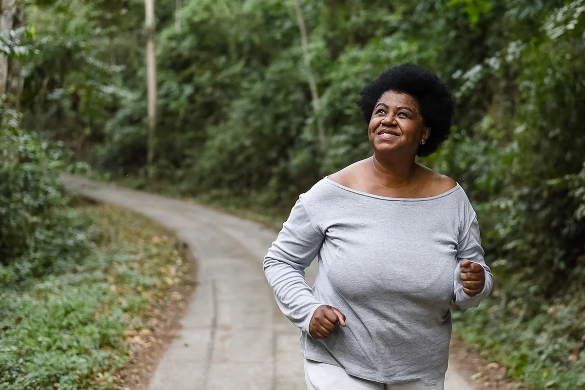 woman running in nature park