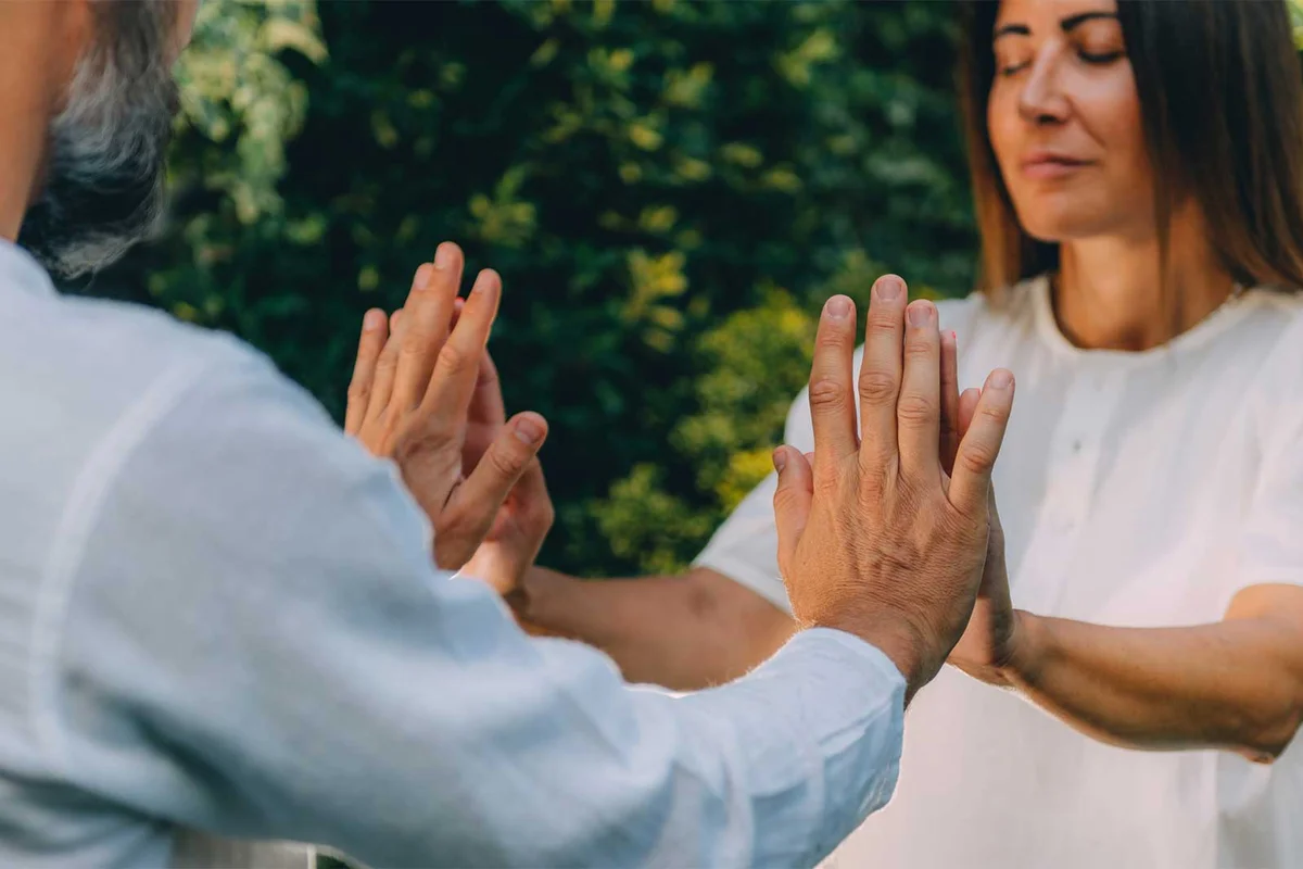reiki instructor with student