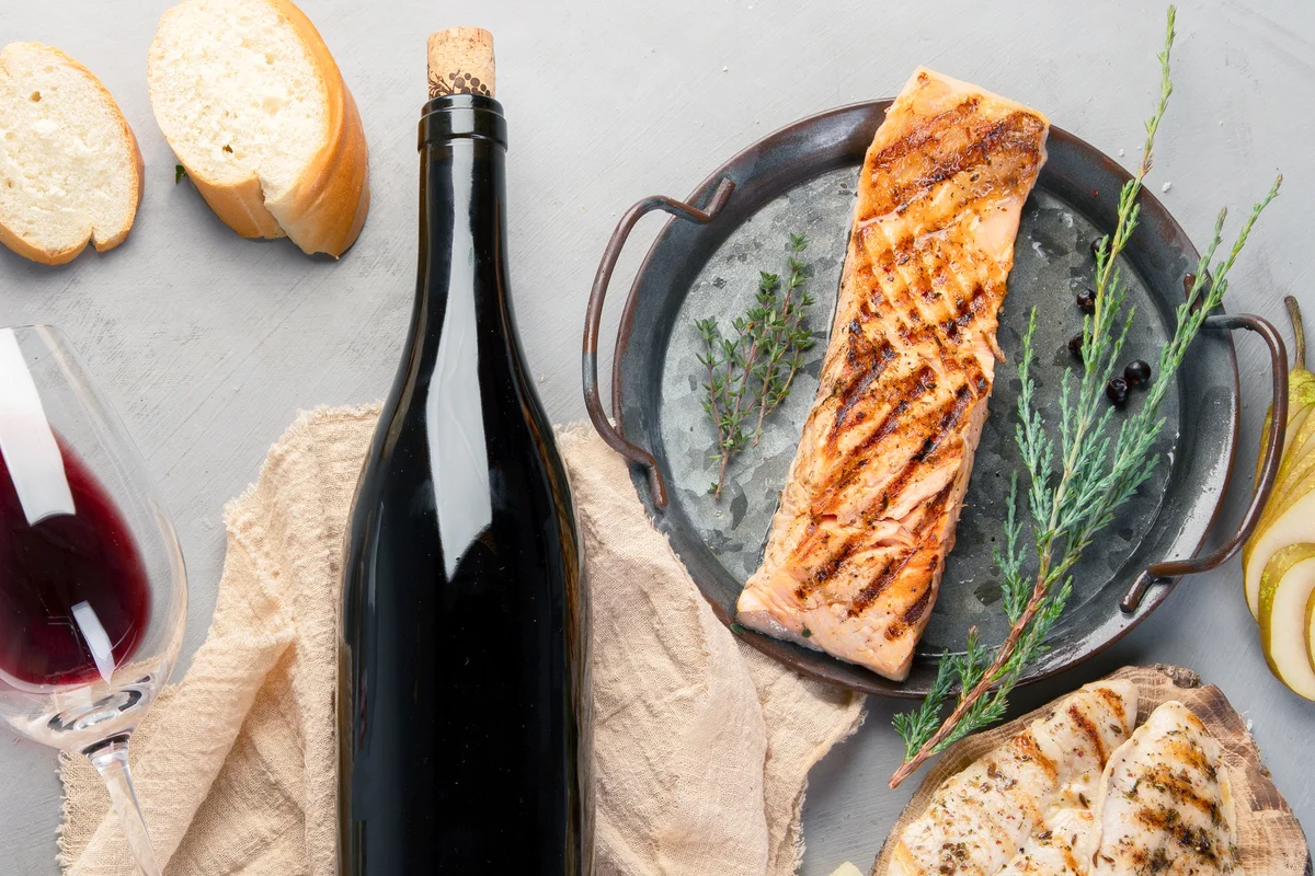 Red wine with appetizers with herbs