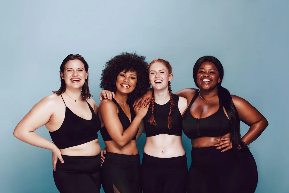 Diverse women embracing their natural bodies