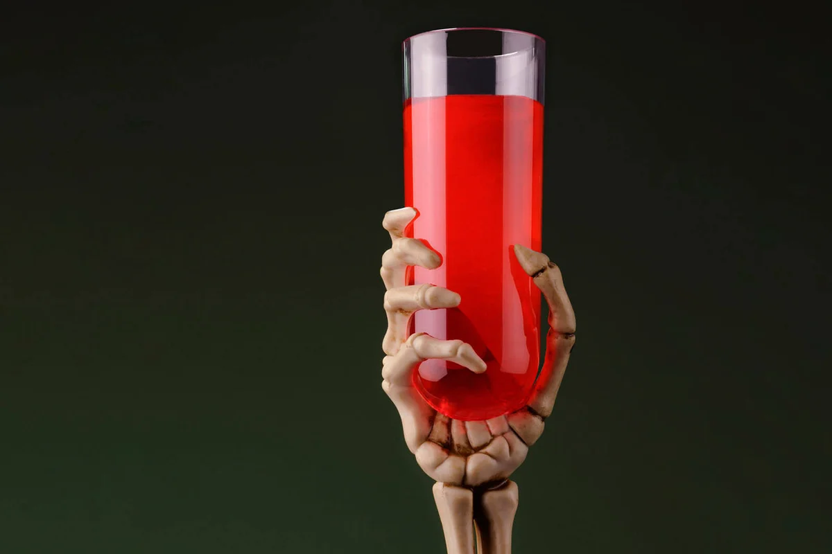 Skeleton Hand with Glass of Blood
