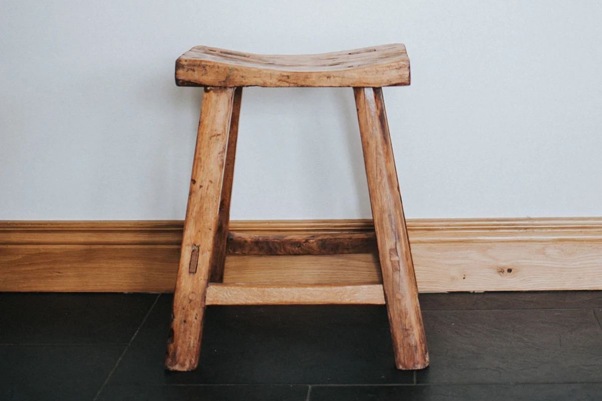 vintage wooden milking stool