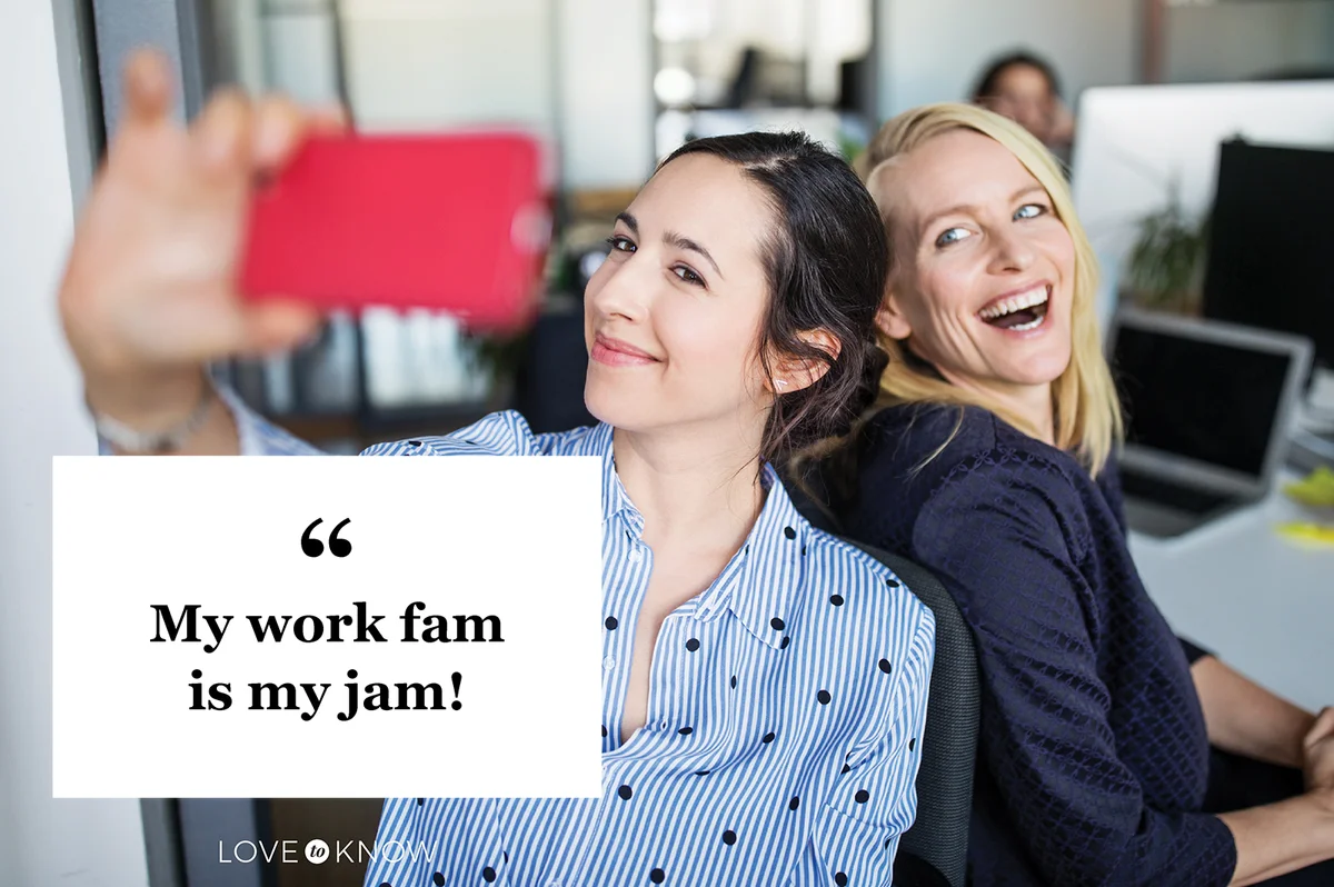 Businesswoman taking selfie with female colleague