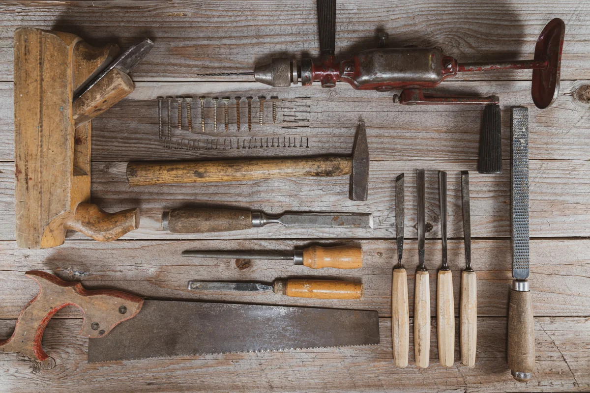 vintage antique woodworking tools displayed on table