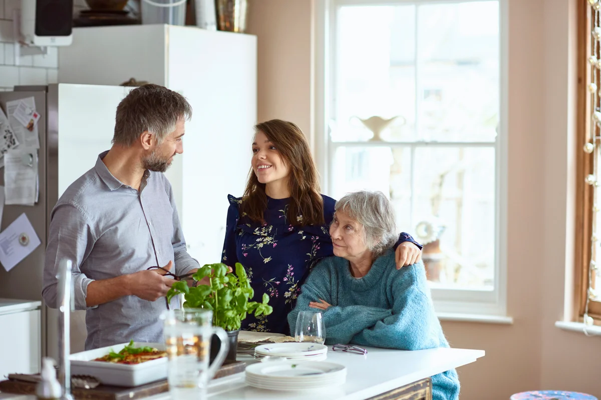 Family talking in the kitchen