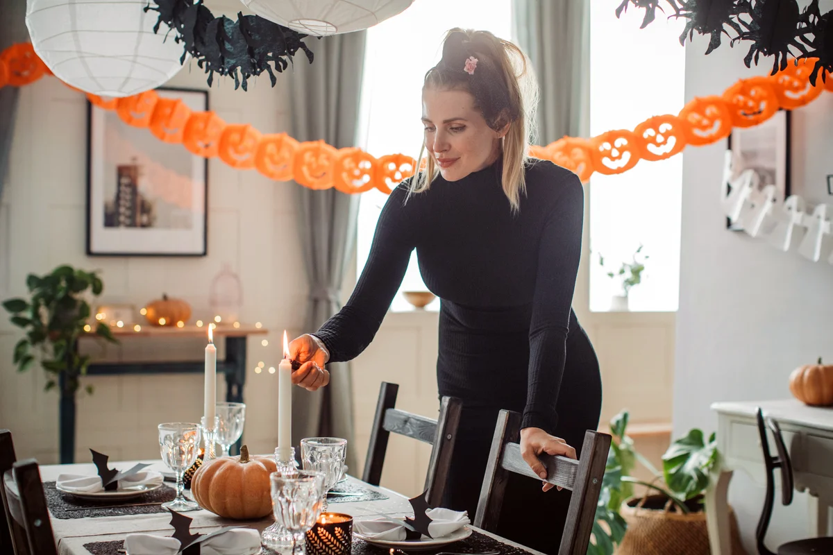 Preparing table for Halloween dinner